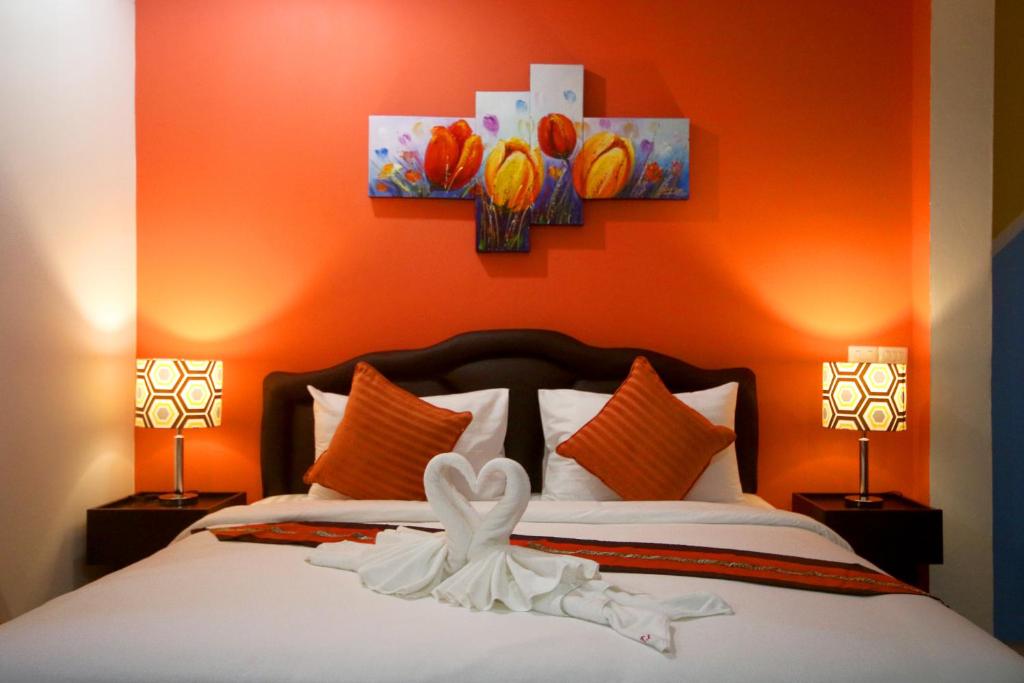 Postel nebo postele na pokoji v ubytování Tulip Inn