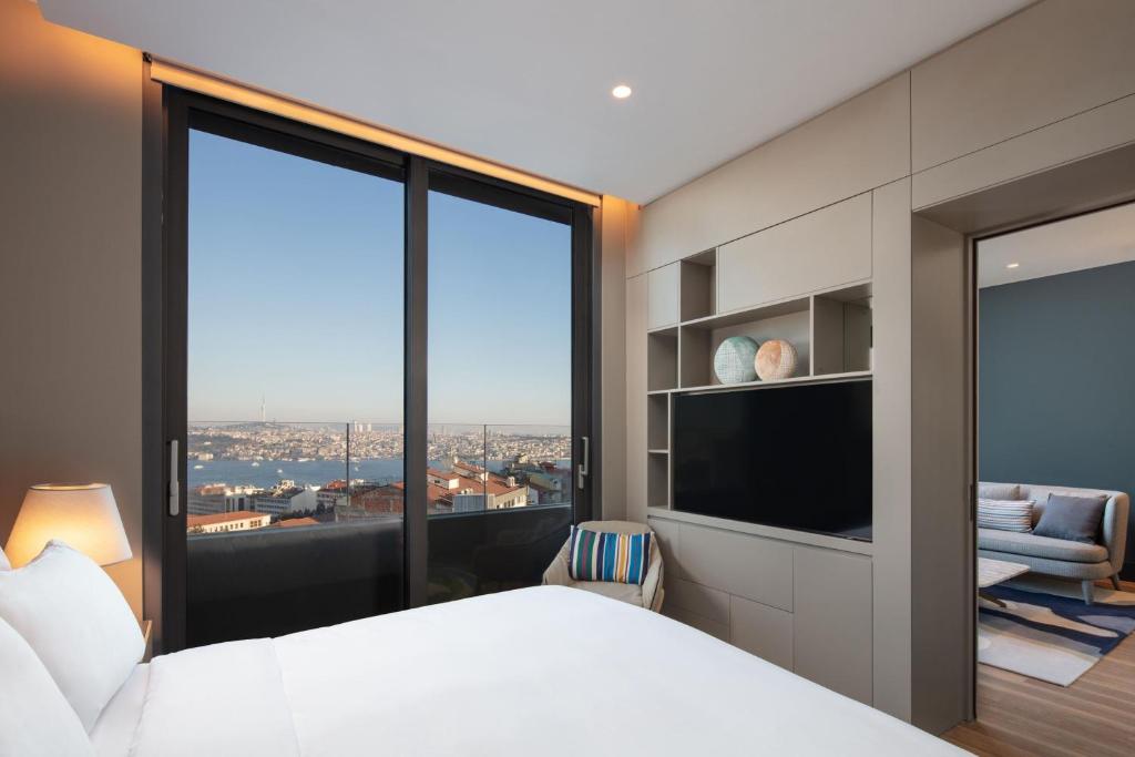 Postel nebo postele na pokoji v ubytování Lokalist, Istanbul, a Tribute Portfolio Hotel