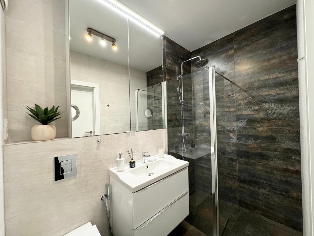 Kúpeľňa v ubytovaní Apartamenty Portova Q4Apartments