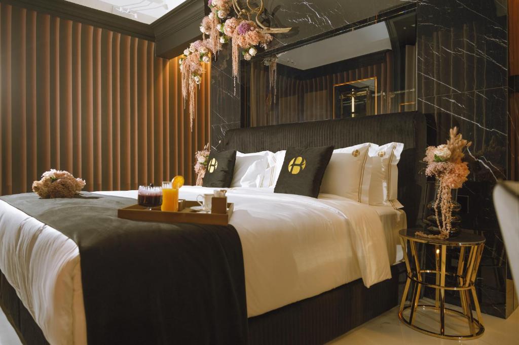 Postel nebo postele na pokoji v ubytování Bra Hotel