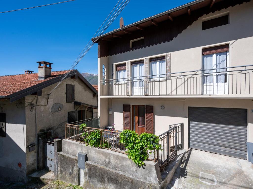an image of a house with a garage at Holiday Home Trekking House by Interhome in Mergozzo