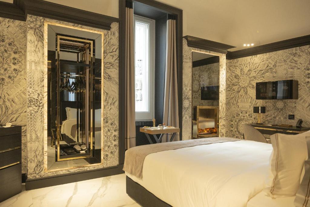 Postel nebo postele na pokoji v ubytování Bra Hotel
