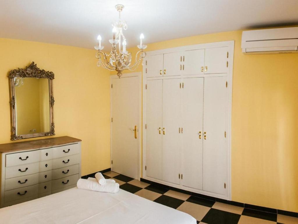Cama o camas de una habitación en Tipica Casa En Frigiliana con patio y terraza