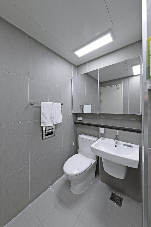 Koupelna v ubytování World Sky Residence Hotel