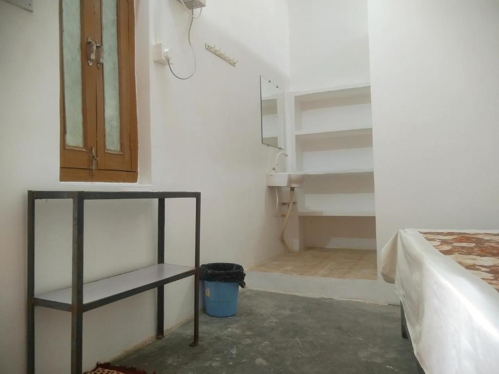 Voodi või voodid majutusasutuse Rashi home stay toas