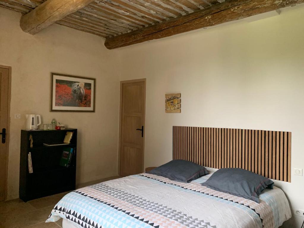 Postel nebo postele na pokoji v ubytování BROSSARD