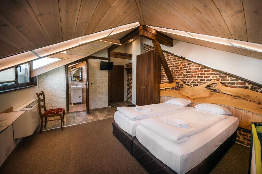 Postel nebo postele na pokoji v ubytování Лондонъ - къща за гости / London - guest house