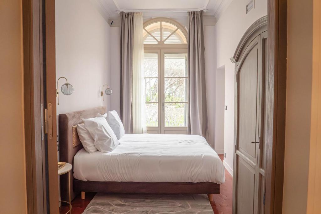 Postel nebo postele na pokoji v ubytování Château du Parc - Gîtes & spas à Pézenas