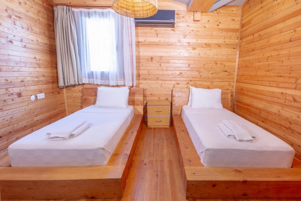 Postel nebo postele na pokoji v ubytování Beach 222 Oludeniz