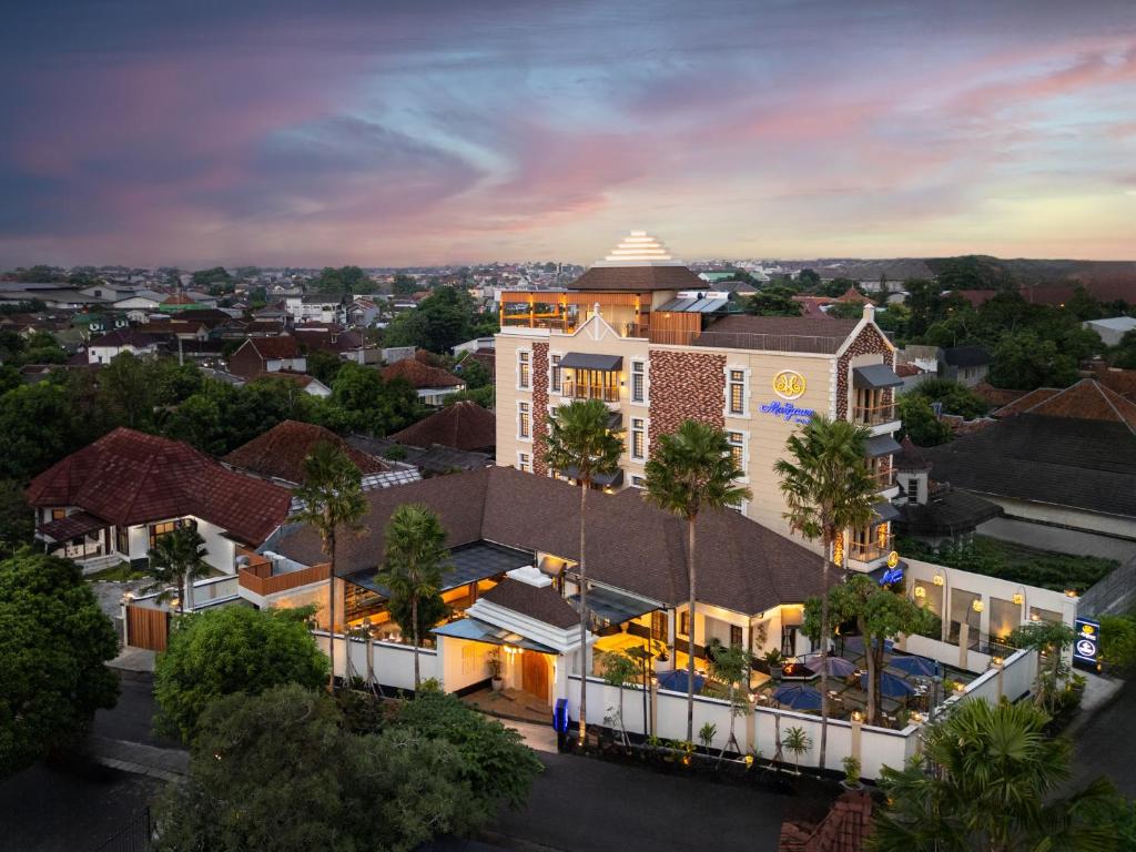 an aerial view of a building in a city at The Margaux Hotel Yogyakarta in Yogyakarta