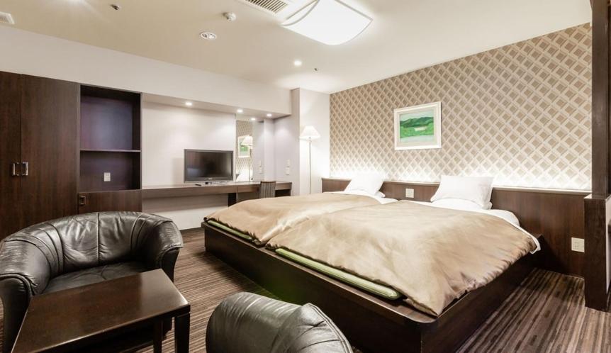 TV a/nebo společenská místnost v ubytování U-BELL Hotel Matsumasa