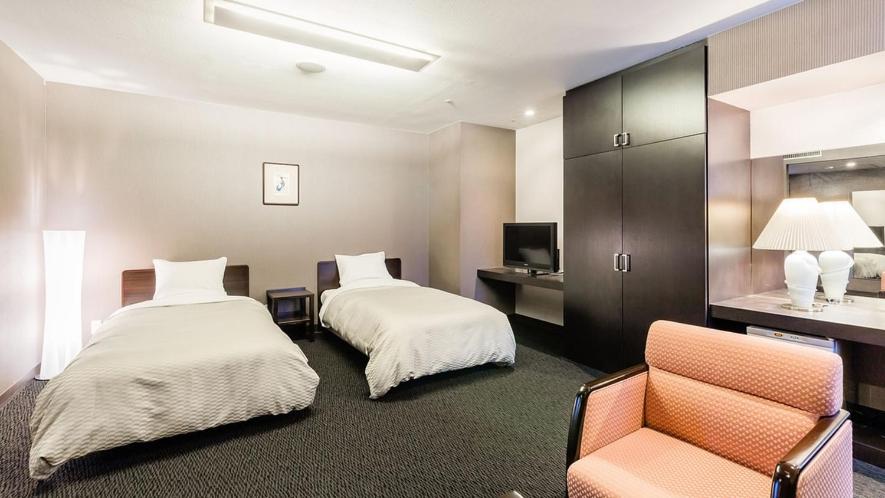 Postel nebo postele na pokoji v ubytování U-BELL Hotel Matsumasa