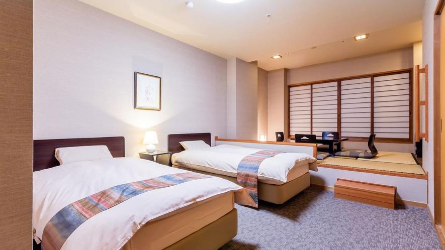 Postel nebo postele na pokoji v ubytování U-BELL Hotel Matsumasa