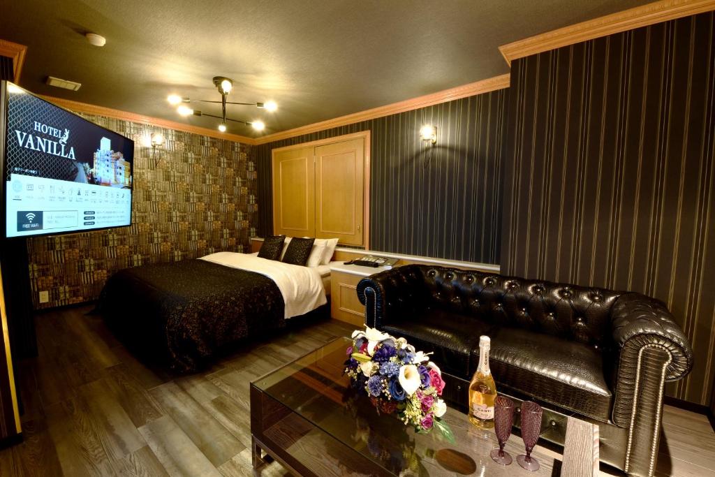 Postel nebo postele na pokoji v ubytování Hotel Vanilla Komaki (Adult Only)