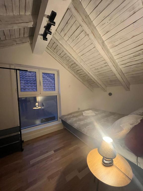 Letto o letti in una camera di Garni Hotel TIANIS