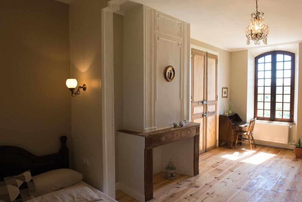Postel nebo postele na pokoji v ubytování Château d'Esplavis