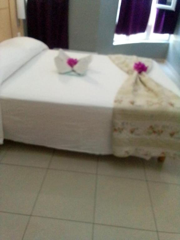 Postel nebo postele na pokoji v ubytování Maison Residencial casa de ferias
