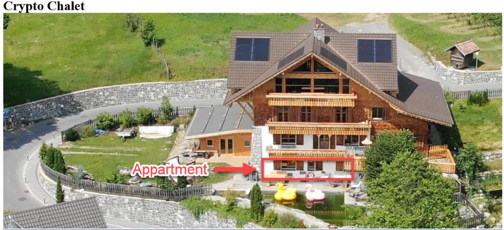 an aerial view of a large house with a restaurant at Alpine Chalet with Natural Pool in Eschen
