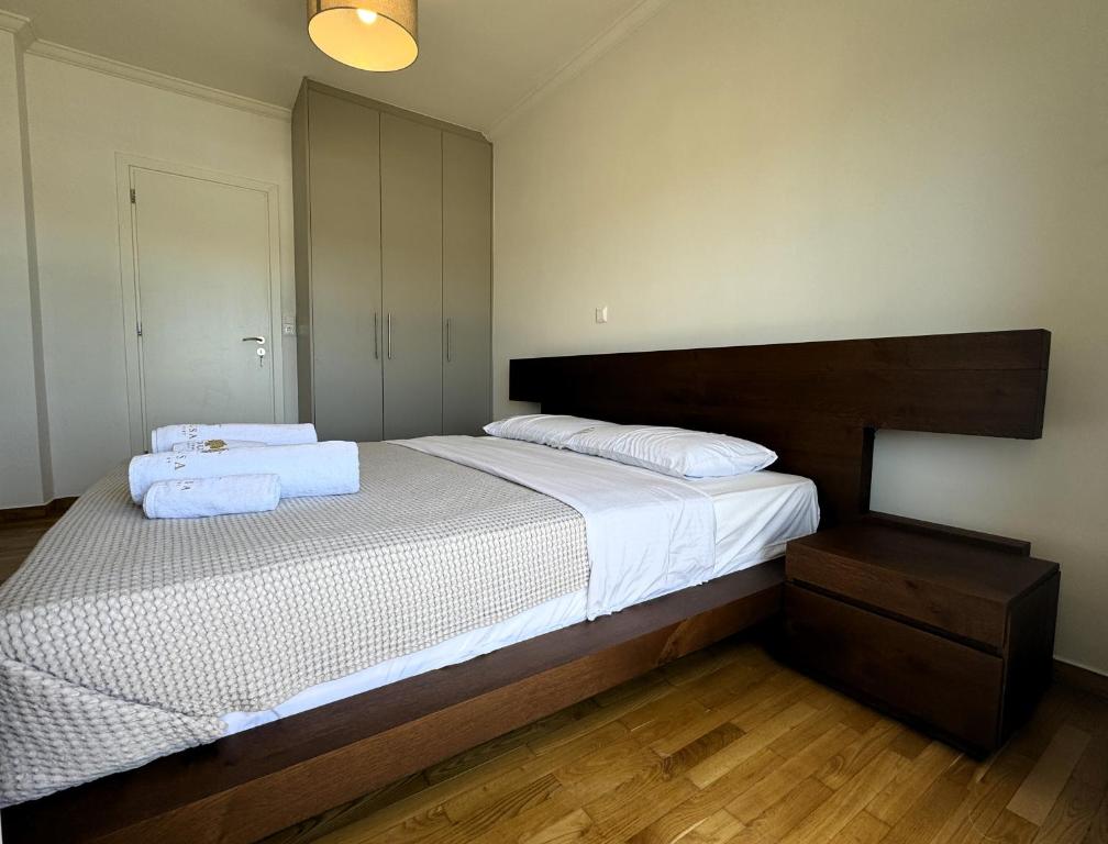 Postel nebo postele na pokoji v ubytování Piraeus center sea view apartment