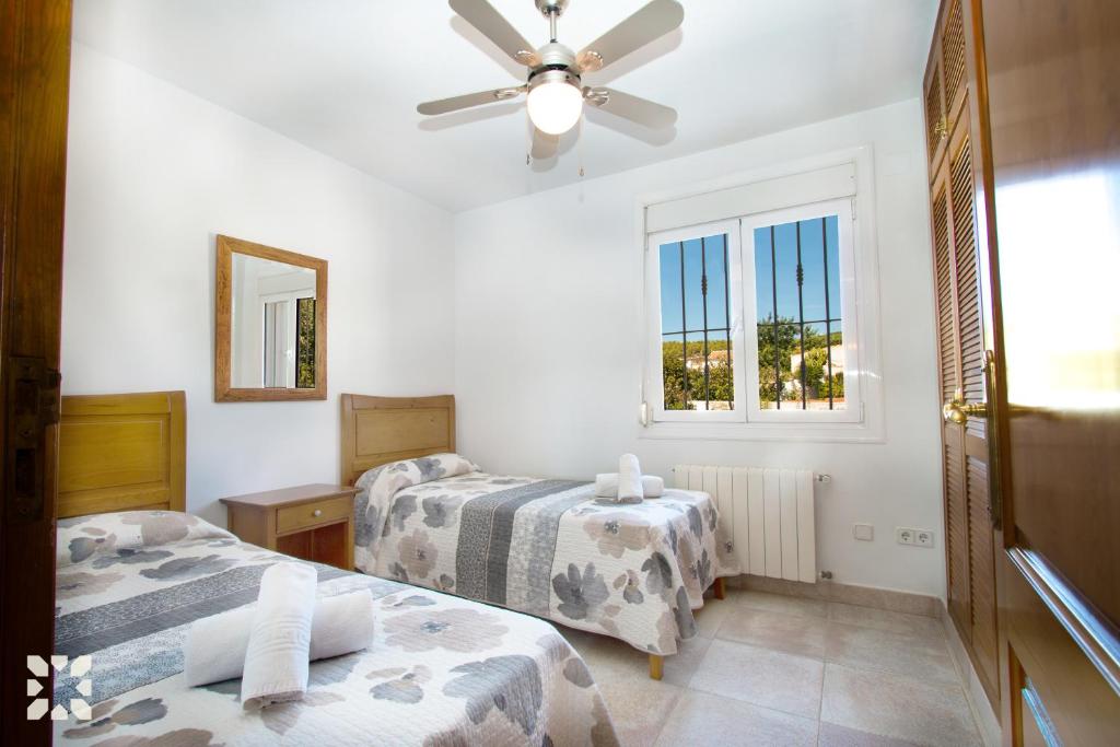 A bed or beds in a room at Villa Soleada by Abahana Villas