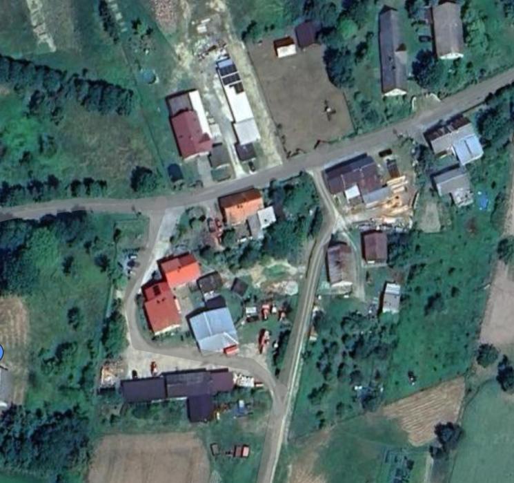 an overhead view of a group of houses and a road at Mieszkanie Nowa Łomnica in Duszniki Zdrój