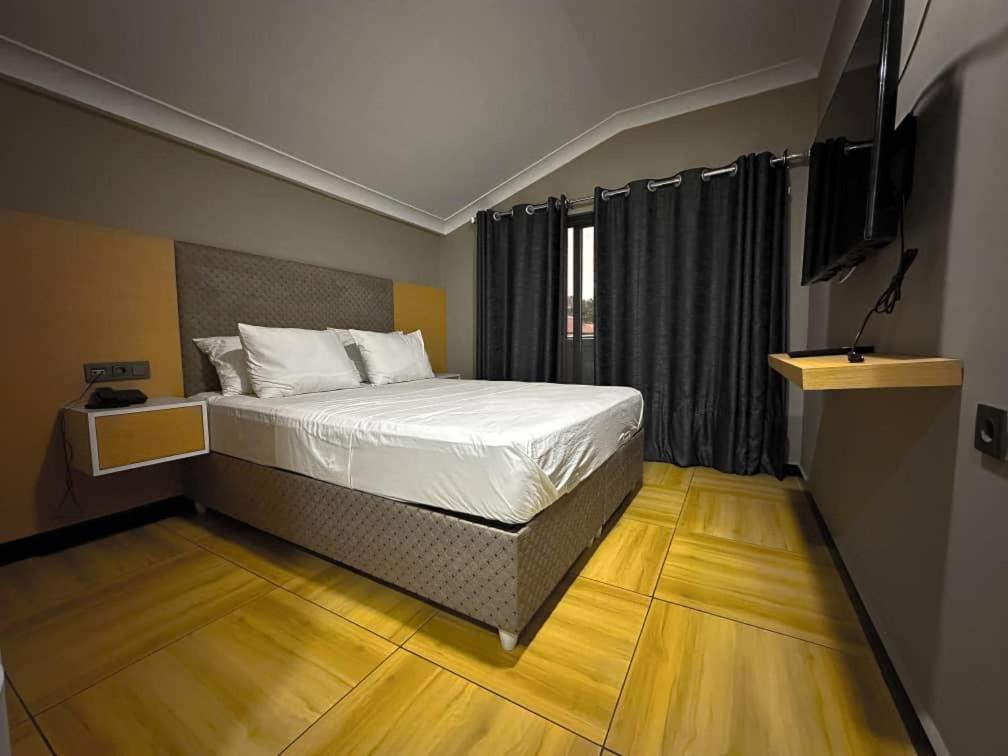 Krevet ili kreveti u jedinici u okviru objekta acacus hotel