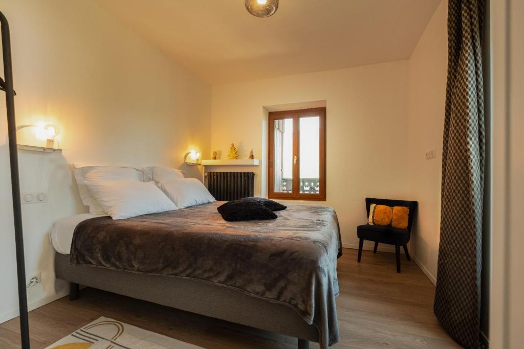 Letto o letti in una camera di Chalet les Myrtilles