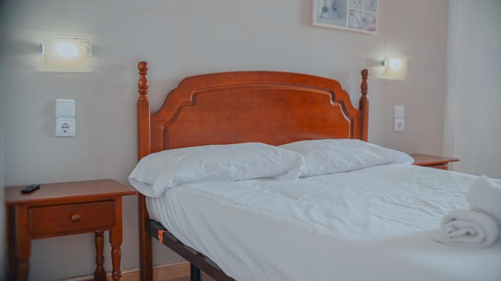 Ένα ή περισσότερα κρεβάτια σε δωμάτιο στο Barraca Suites
