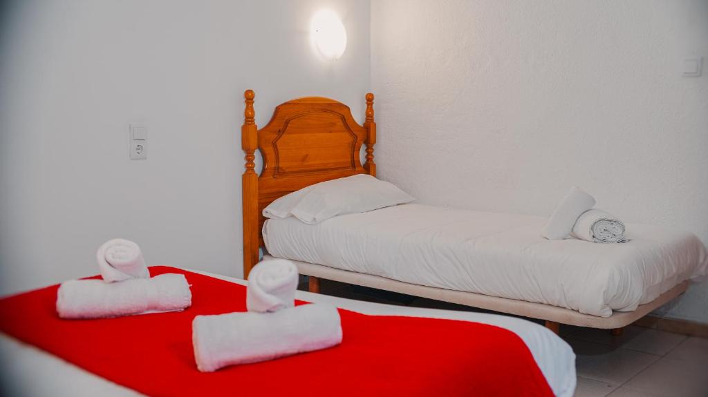 Ένα ή περισσότερα κρεβάτια σε δωμάτιο στο Barraca Suites