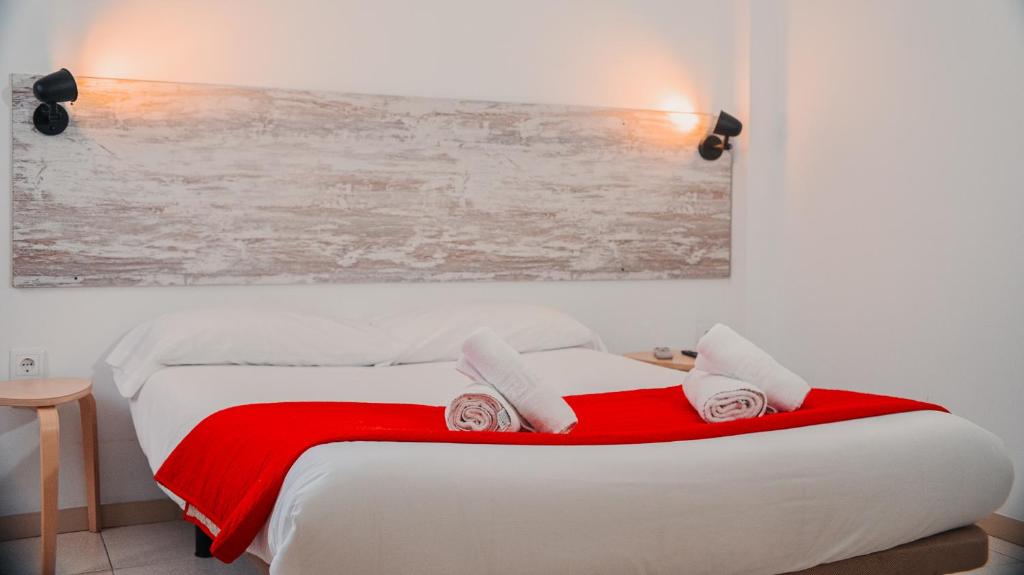 Ένα ή περισσότερα κρεβάτια σε δωμάτιο στο Barraca Suites