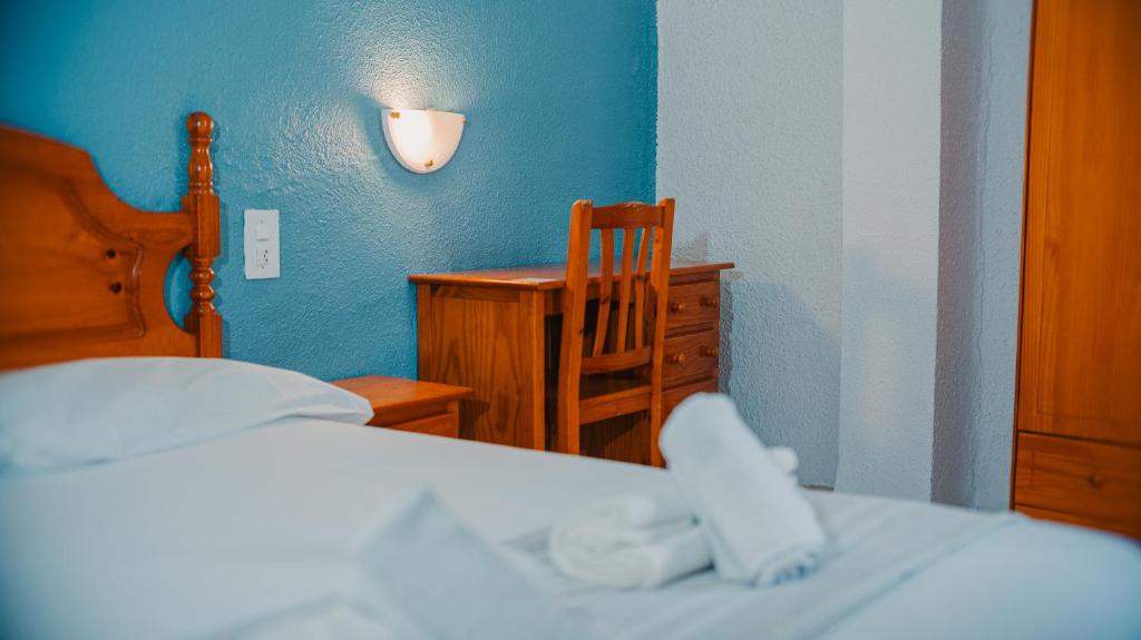 Ένα ή περισσότερα κρεβάτια σε δωμάτιο στο Barraca Suites