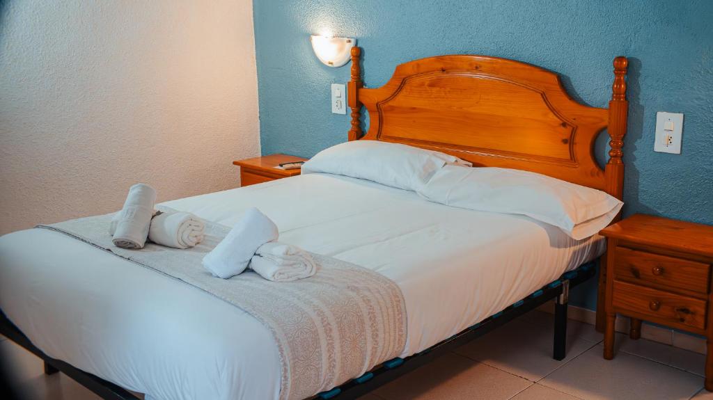 Ένα ή περισσότερα κρεβάτια σε δωμάτιο στο Barraca Suites
