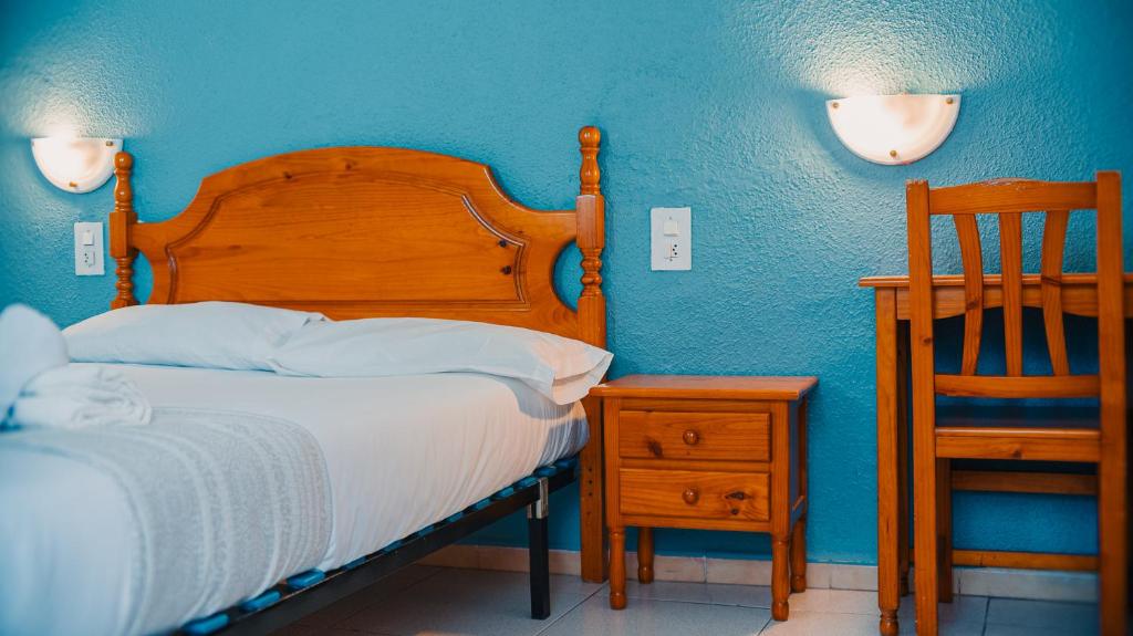 Ένα ή περισσότερα κρεβάτια σε δωμάτιο στο Barraca Suites