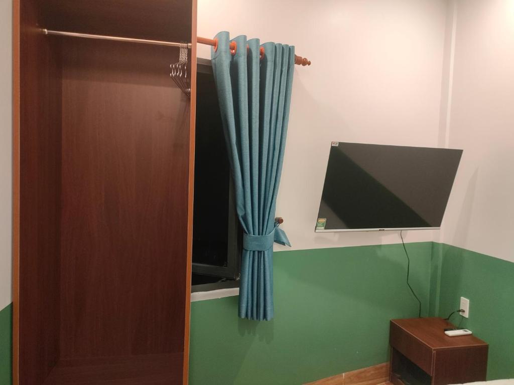 TV a/nebo společenská místnost v ubytování Nineties homestay