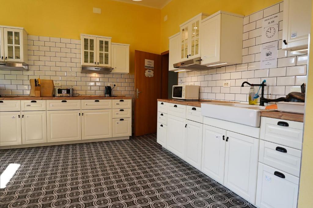 Kuchyň nebo kuchyňský kout v ubytování House Budkovič