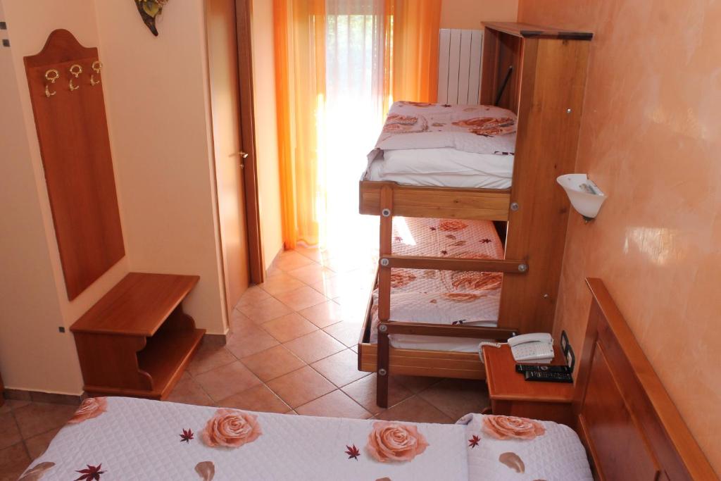 Hotel LA LOGGIA - Habitación Cuádruple