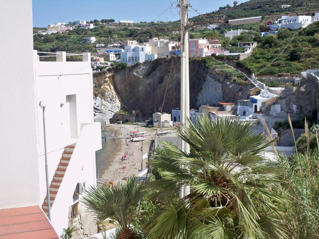 a view of the beach from the balcony of a house at L'Isolana Case Vacanza Alloro 1 in Ponza