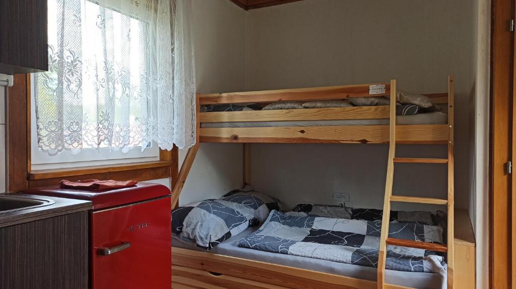Postel nebo postele na pokoji v ubytování Chaloupka u Vejvodů