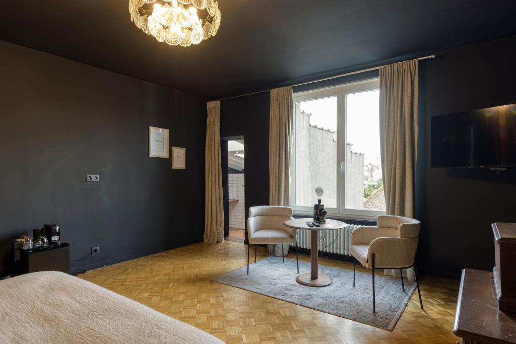 Postel nebo postele na pokoji v ubytování Atelier K - Art Guesthouse in Brussels