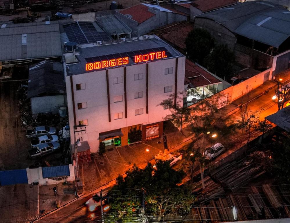 an overhead view of a building with a sign on it at Borges Hotel in Imperatriz