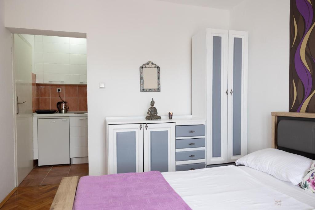 Postelja oz. postelje v sobi nastanitve Apartmani Novkovic