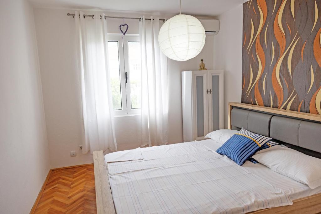 Postelja oz. postelje v sobi nastanitve Apartmani Novkovic