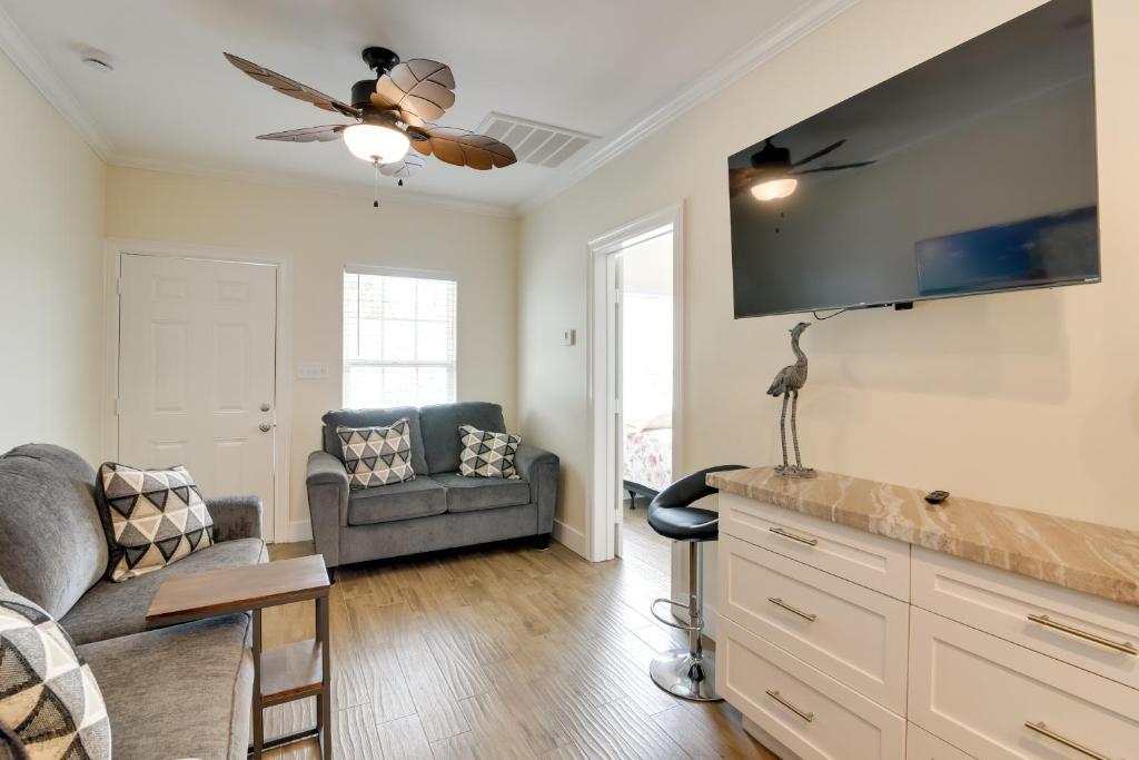 a living room with a couch and a chair at Less Than 1 Mi to Historic Pleasure Pier Galveston Home! in Galveston