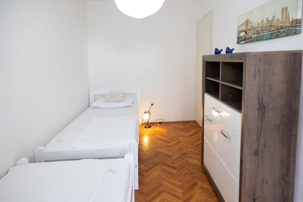 Postelja oz. postelje v sobi nastanitve Apartmani Novkovic