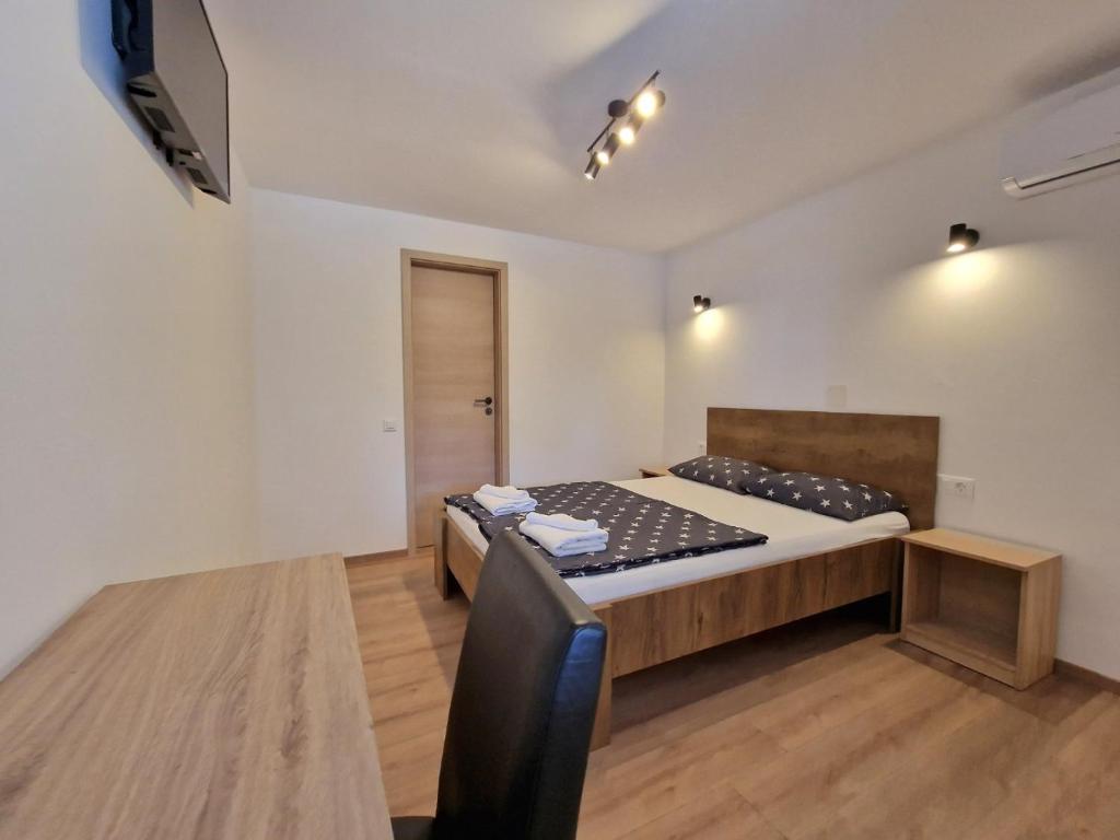 Postel nebo postele na pokoji v ubytování Room D