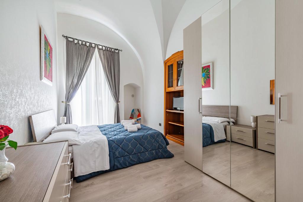 Postel nebo postele na pokoji v ubytování B&b SAN LORENZO