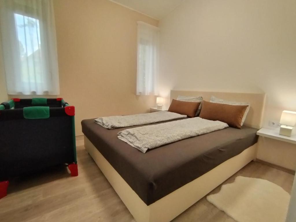 Posteľ alebo postele v izbe v ubytovaní Villa Bori Siófok