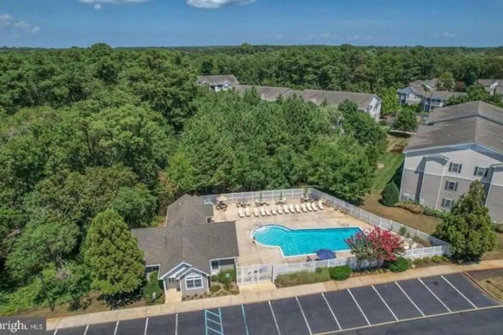 an aerial view of a house with a swimming pool at Family perfect getaway 2 bedroom apartment in Rehoboth Beach