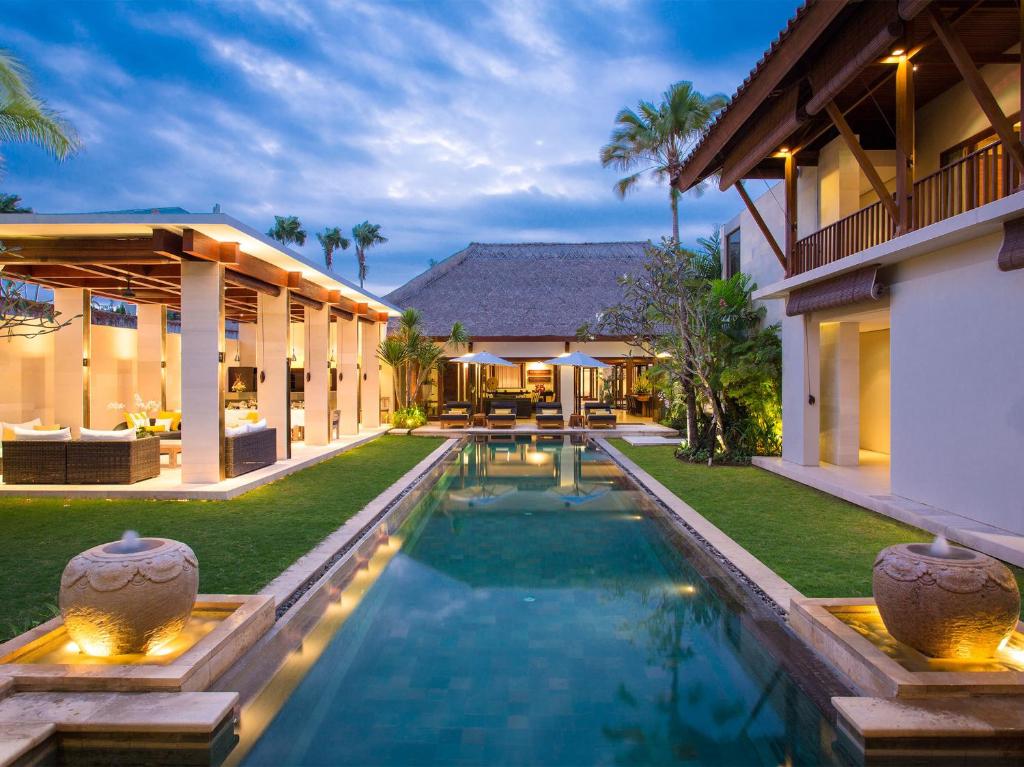 an exterior view of a villa with a swimming pool at Villa Lilibel by Elite Havens in Seminyak