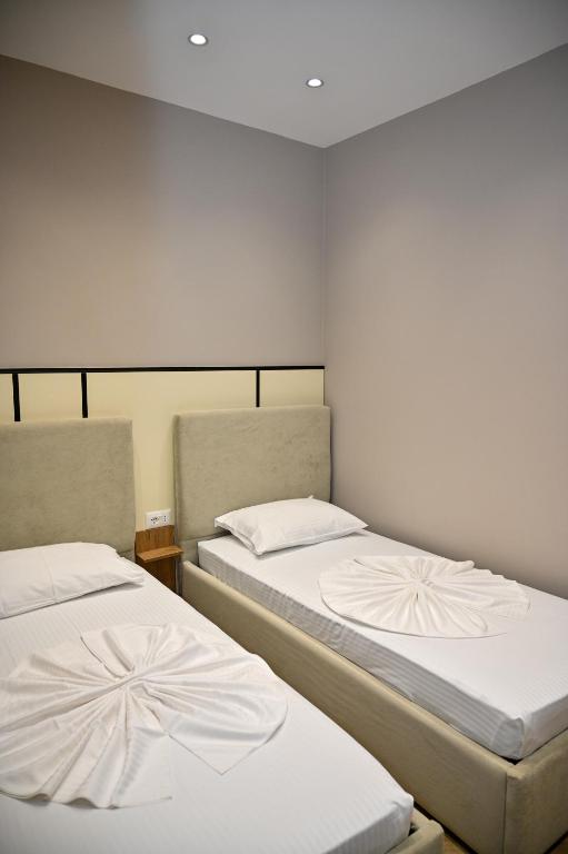 Voodi või voodid majutusasutuse MondurO Hotel toas